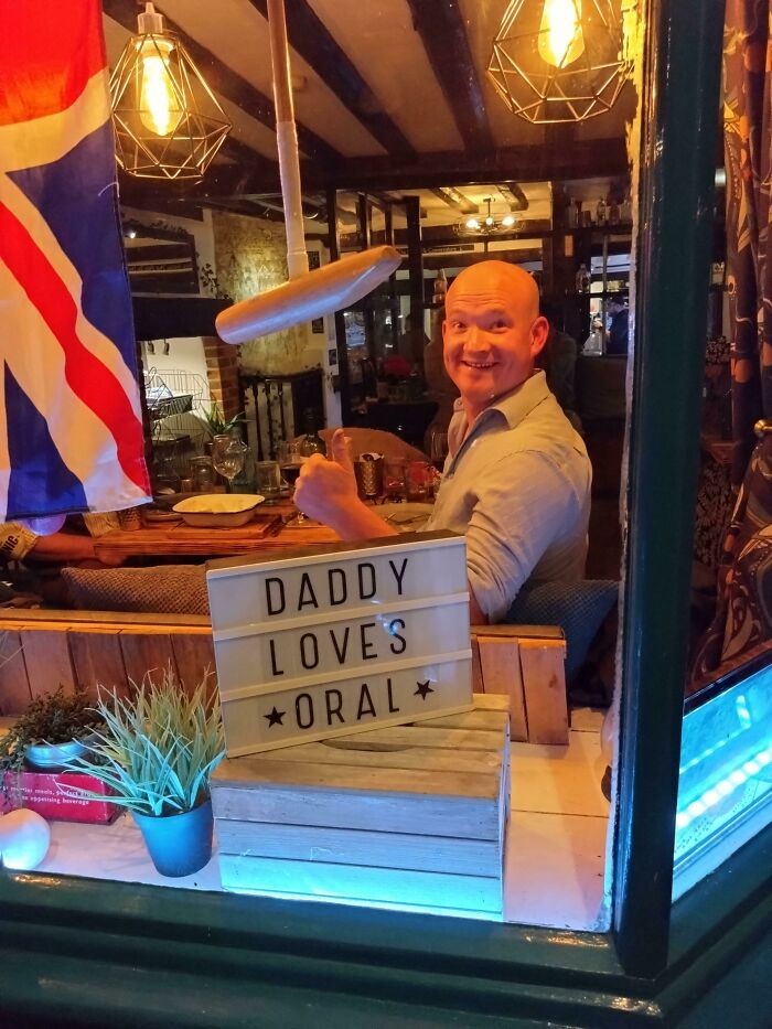 Mildly Vandalised A 'Food Served All Day' Sign