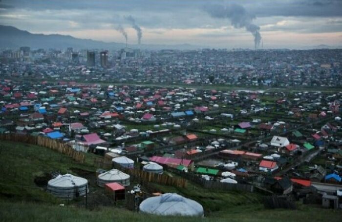 Ulaanbaatar, Mongolia - More Than 60% Of The Population Do Not Have Plumbing. Instead Rely On Outhouse Toilets & Communal Wells For Fresh Water. Hardly Any Paved Roads With Stray Dogs Lurking Around