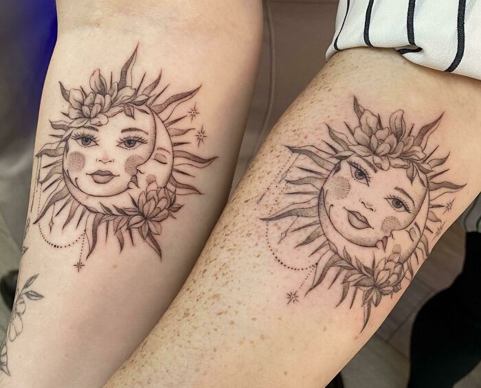 Matching sun and moon tattoos on two arms, symbolizing friendship.