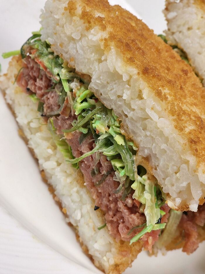 A Spicy Tuna Burger With A Fried Rice Bun