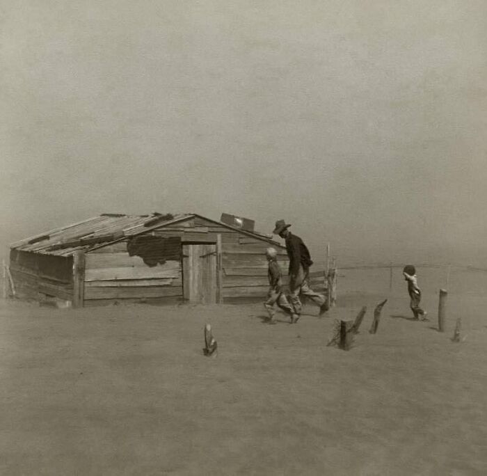 Farmer And Sons Walking In The Face Of A Dust Storm. Cimarron County, Oklahoma. April, 1936. Photo Taken By Arthur Rothstein