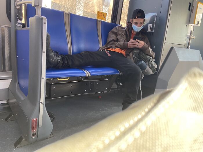 This Guy On My Bus To Work Sat Like This In The Elderly/Disabled Priority Section And Was Playing His Lousy Music On Speaker