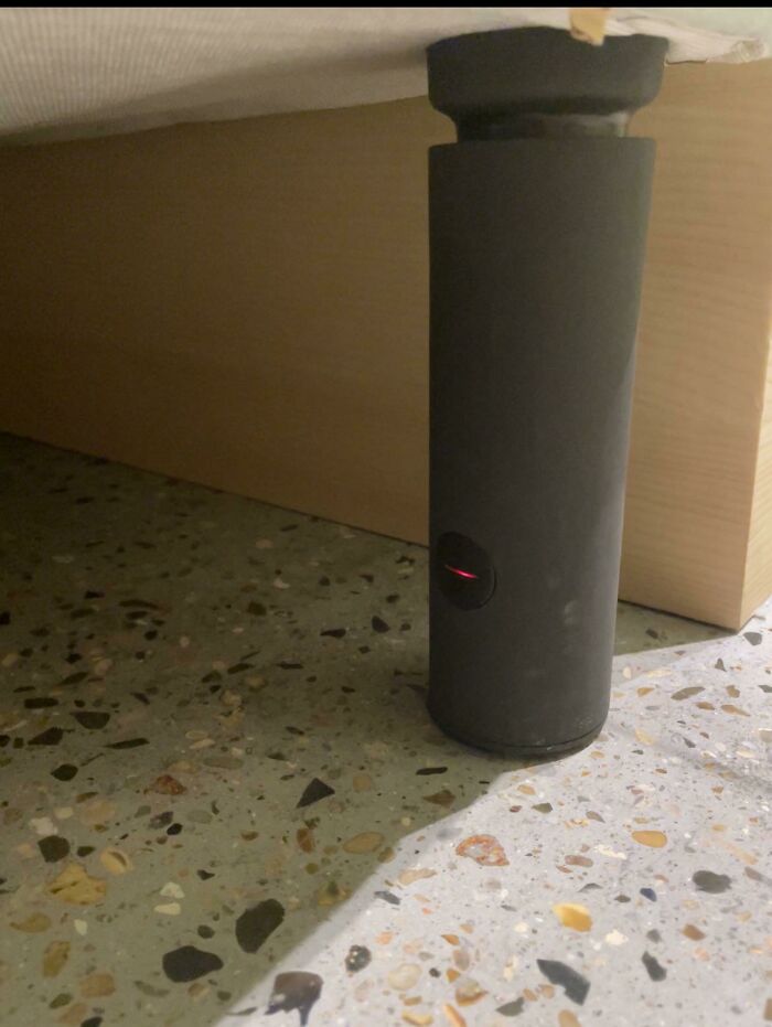 Hotel Room Bed Leg Has Red Flashing Light Coming From Rubber Piece…