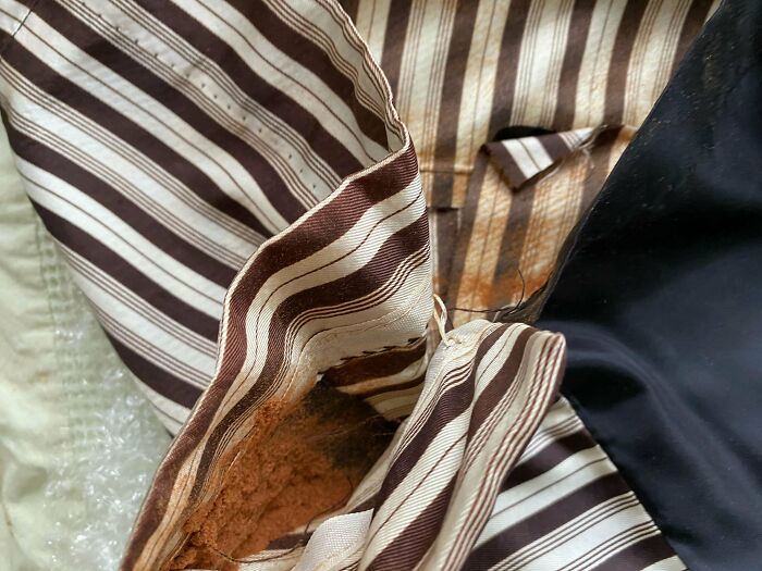 Bought A Coat Dress From Vintage Store In North Eastern Us And Found Brown Powder Sewn Inside While Letting Out Seams. Haven’t Touched It But It Appears To Be Sewn Into The Entire Garment. Think The Coat Is From The 60s Or 70s