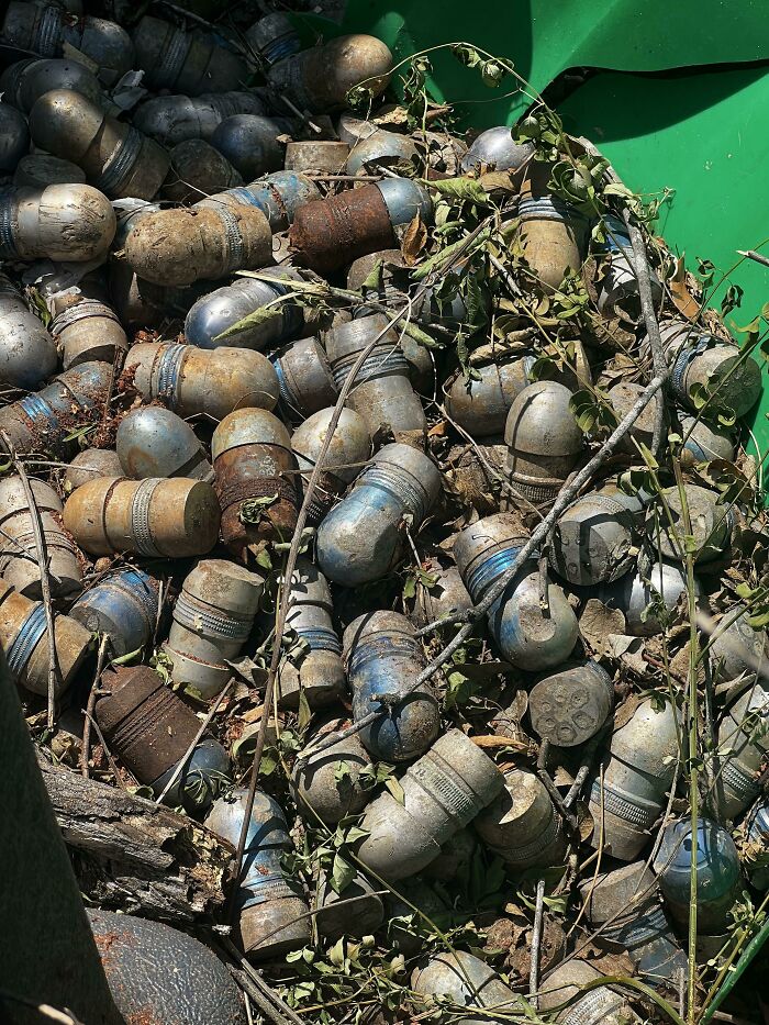 Found These In A Bin In My Backyard After Doing Some Yard Clean Up. They Are Metal And Round On One Side. Approximately 2” Diameter By 4” Long. On The Flat Side There Are Six Circles