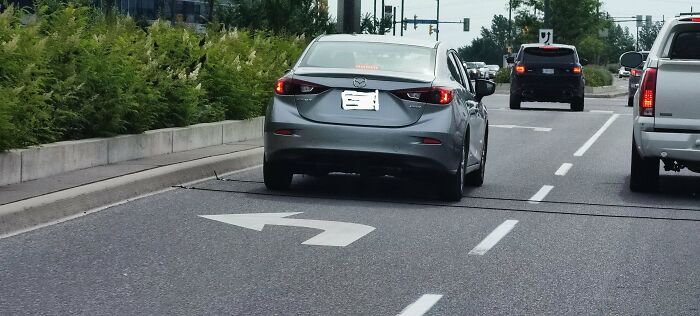 Two Wires On Busy Suburban Street, Reappears At Fixed Intervals