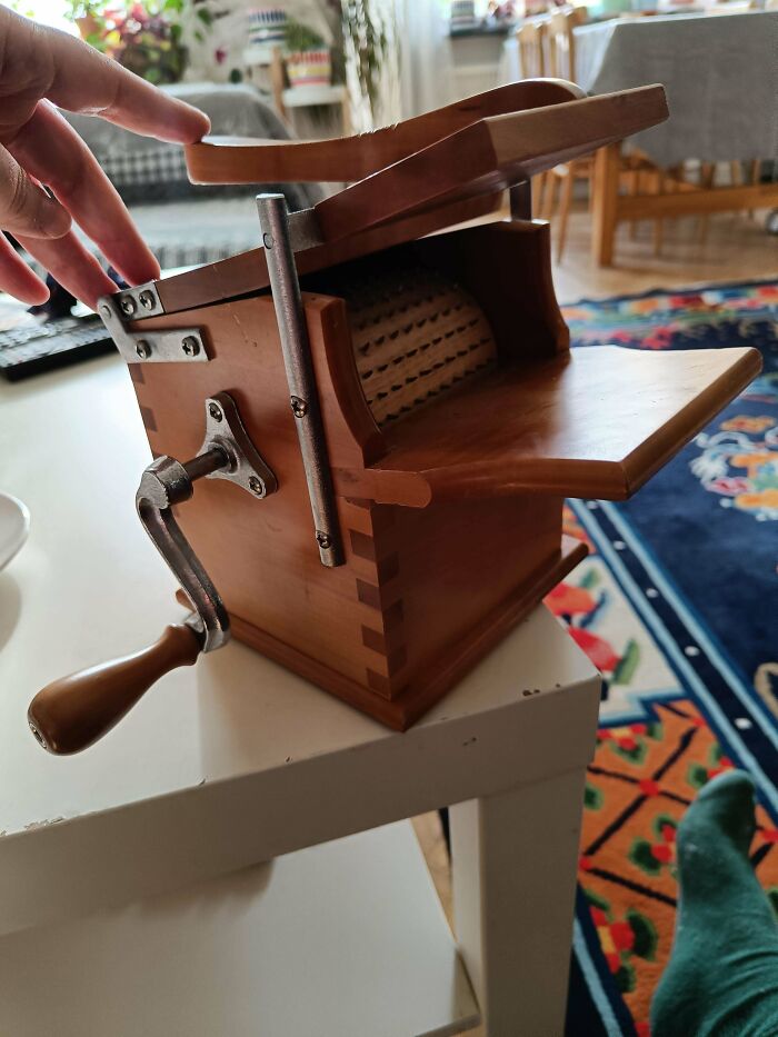 What Could This Be? It's Made Of Wood And Contains A Wheel Full Of Sharp Spikes. I'm Thinking A Grinder, But What Could It Grind?