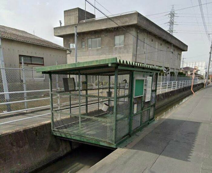 Cage Room Thing On Top Of A Stream In Japan