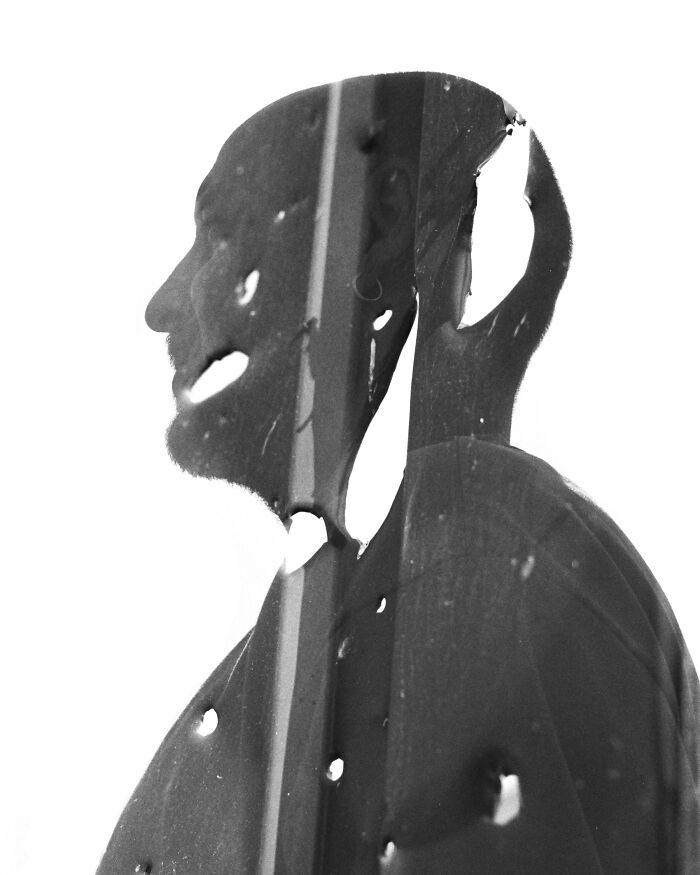 Double exposure photo of a volunteer in Ukraine by Andrii Denysenko