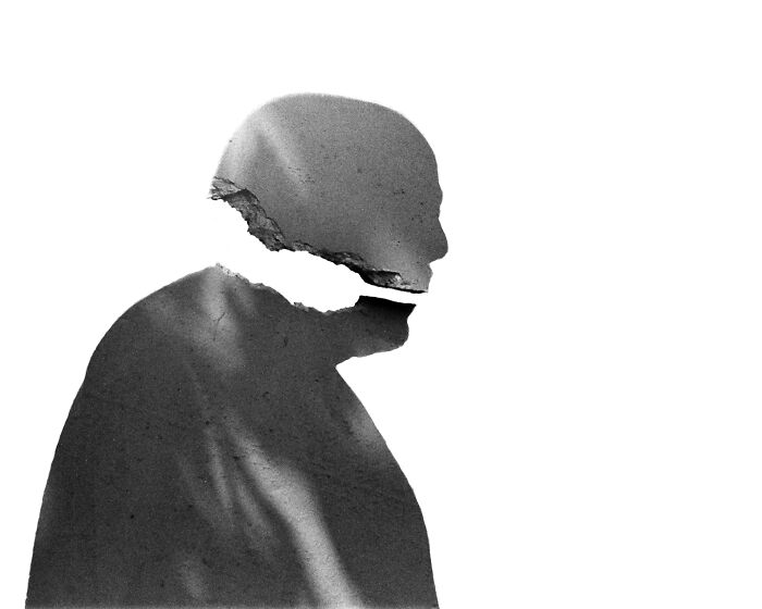 Double exposure photo of a volunteer in Ukraine by Andrii Denysenko