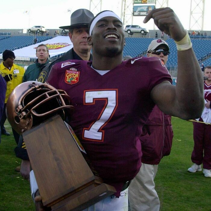 Michael Vick holding trophy