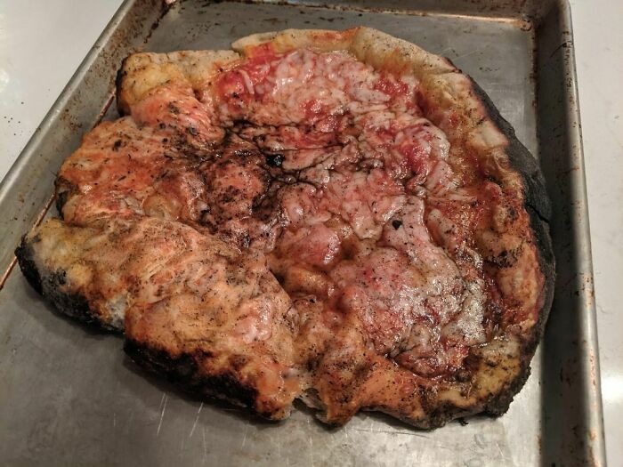 Our Airbnb Had A Brick Oven. We Tried Making Pizza