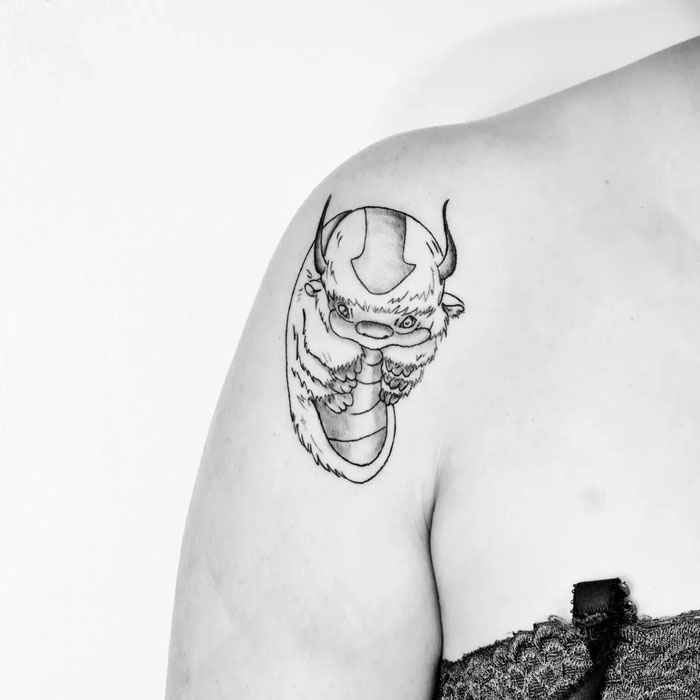 Appa tattoo on shoulder evokes cartoon nostalgia from Avatar: The Last Airbender.