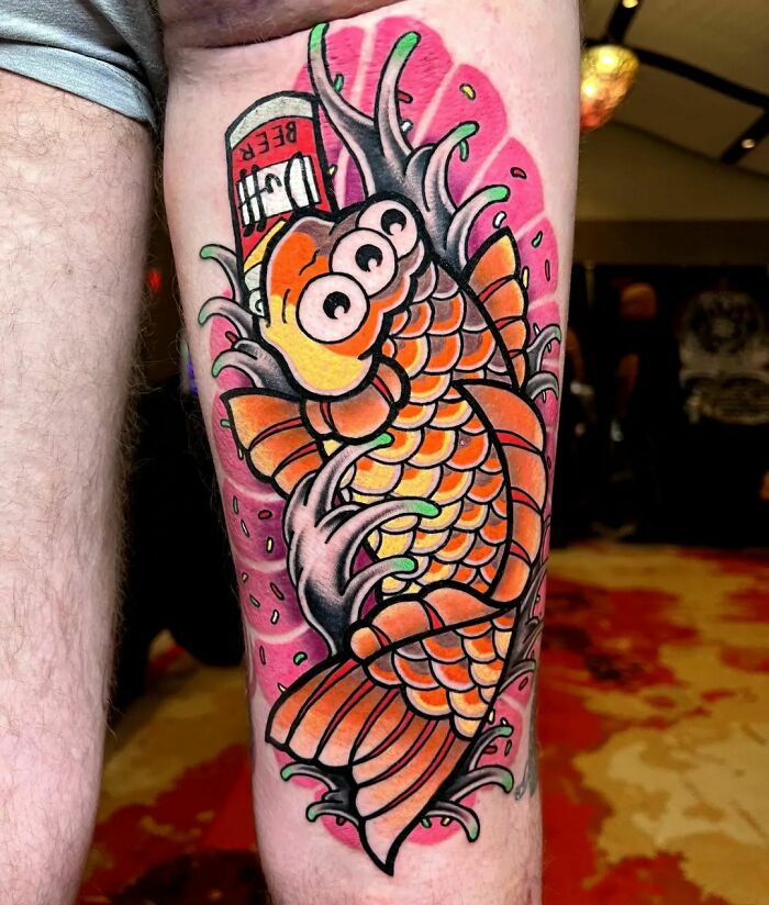 Cartoon tattoo of a colorful fish with a can of beer, showcasing vibrant colors reminiscent of childhood favorites.