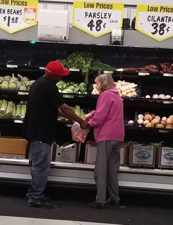 Dude Saw A Little Old Lady Was Having Trouble Bagging Some Stuff So He Stopped And Held Her Bag Open For Her