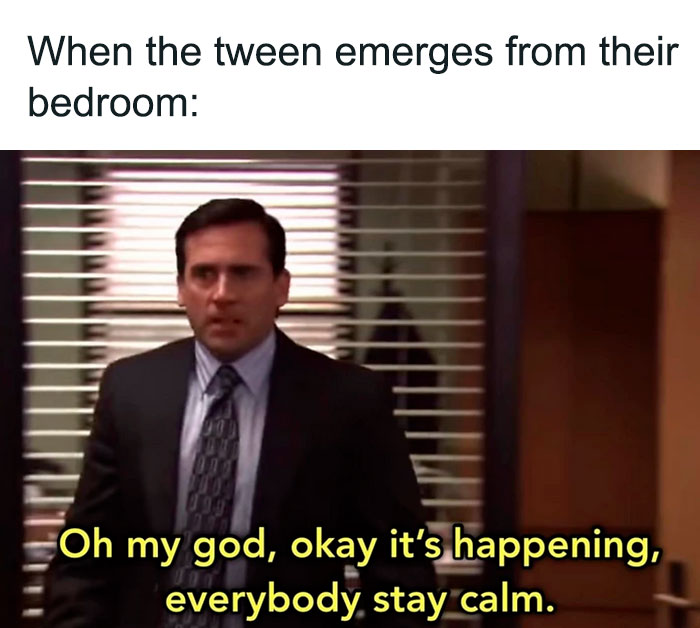 Man in office reacting with urgency, capturing the chaos of fatherhood humor.