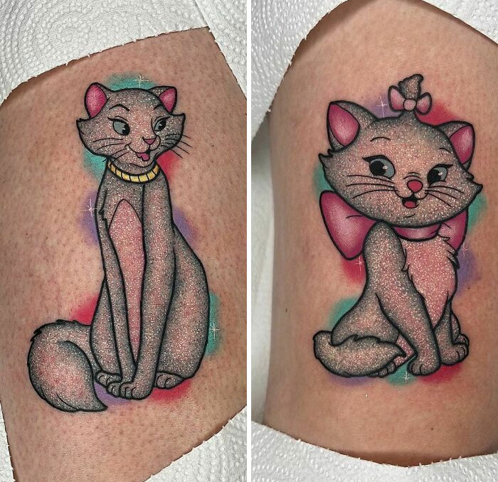 Two glitter tattoos of animated cats with colorful accents on skin.