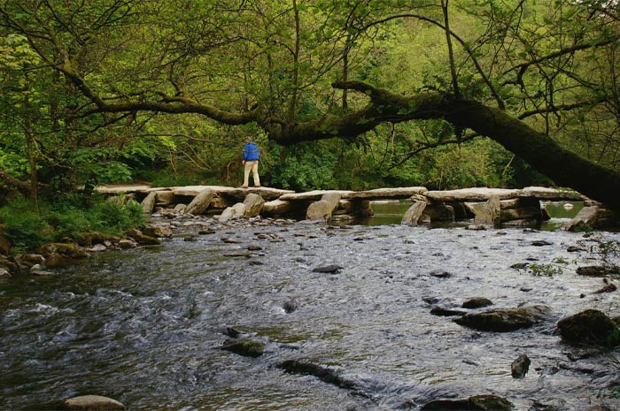 Tarr Steps bridge with river and trees