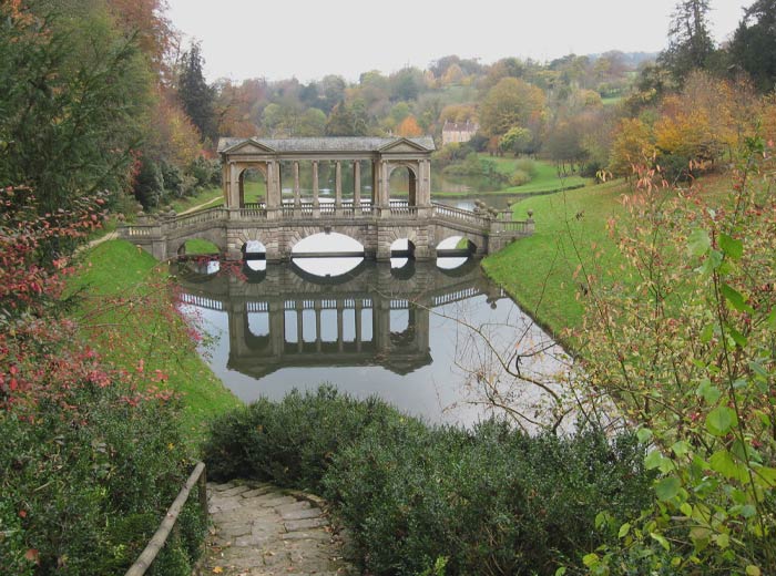 Palladian bridge near forest