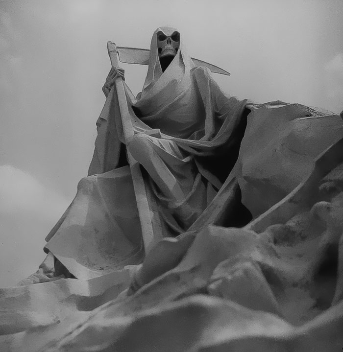 Black and white sculpture of Grim Reaper 