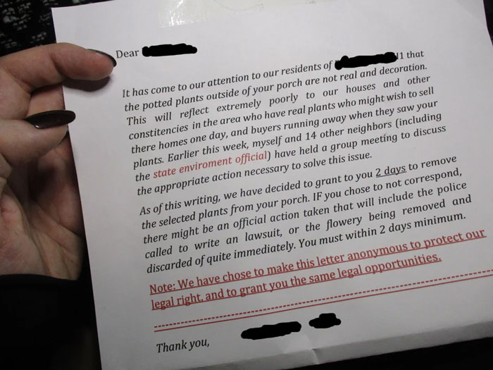 Delusional Neighbor Writes An Anonymous Letter To This Person Demanding They Get Rid Of Fake Plants On Their Porch Before They Take Legal Action