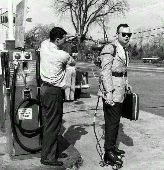 A Salesman Has His Motorized Roller Skates Refueled. Connecticut, 1961