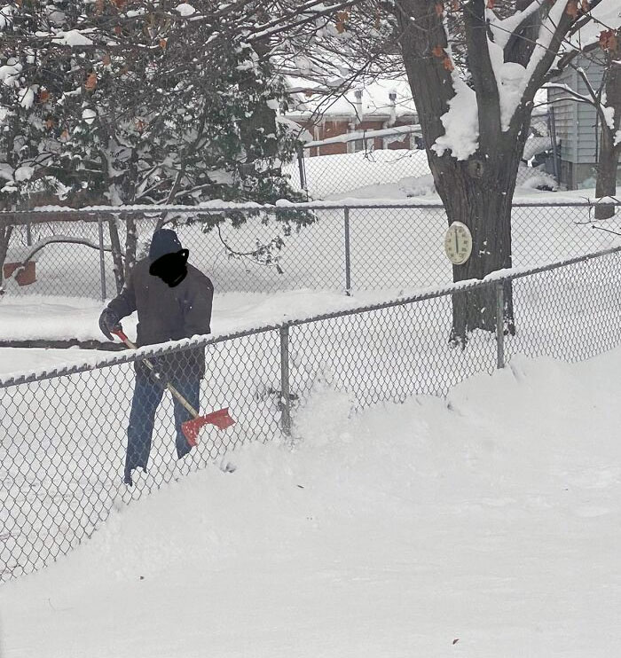 My Neighbor Shoveling His Backyard Into Mine