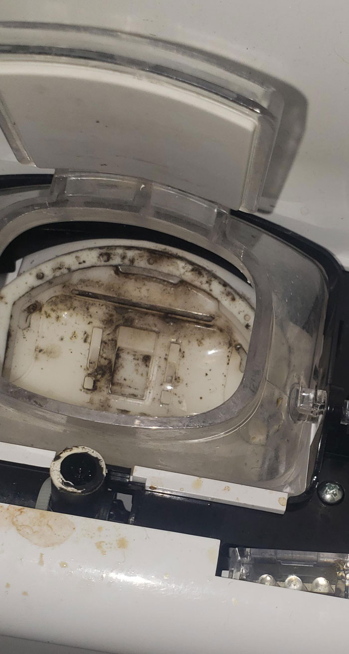 The Inside Of My Fridge's Ice And Water Dispenser