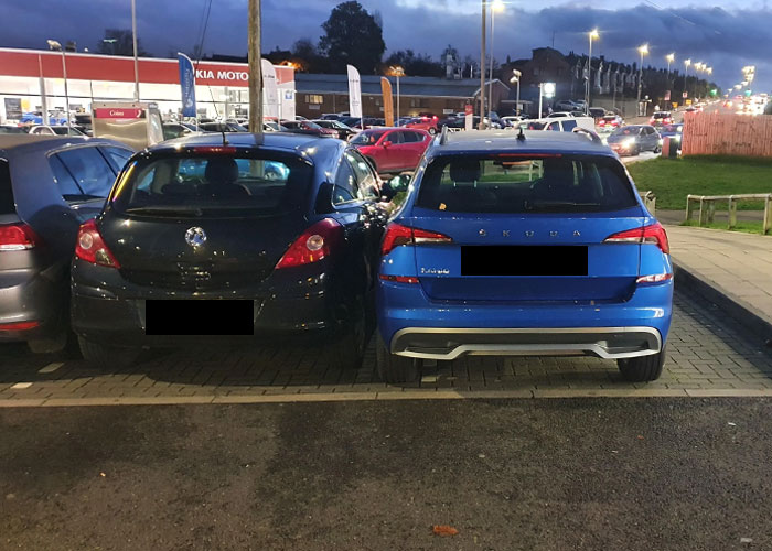 Guy Spots Two Cars Taking Up Multiple Spaces So Nobody Parks Next To Them, Finds A Satisfying Way To Get His Point Across Guy Spots Two Cars Taking Up Multiple Spaces So Nobody Parks Next To Them, Finds A Satisfying Way To Get His Point Across