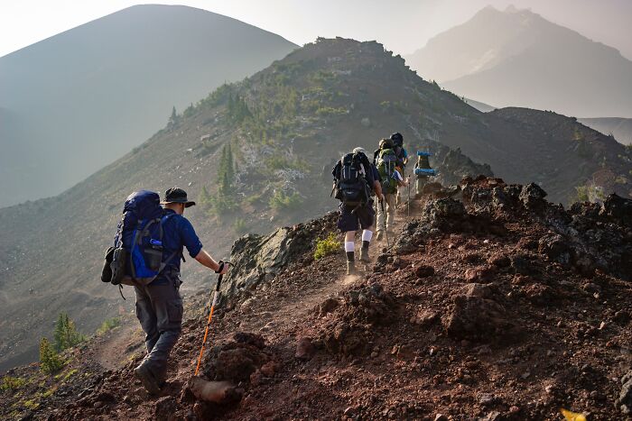 People Hiking On Mountain Top 