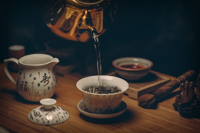 Pouring Water On Tea 