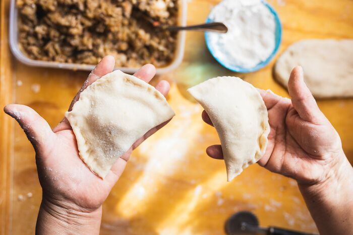 Person Making Dumplings From Scratch 