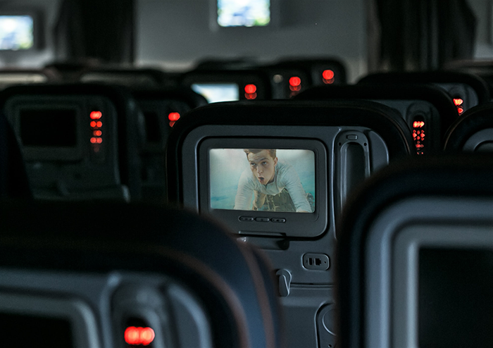 Woman Demands Another Plane Passenger Turn Off Her Movie So She Can Avoid Spoilers, Starts Acting Petty When She Refuses