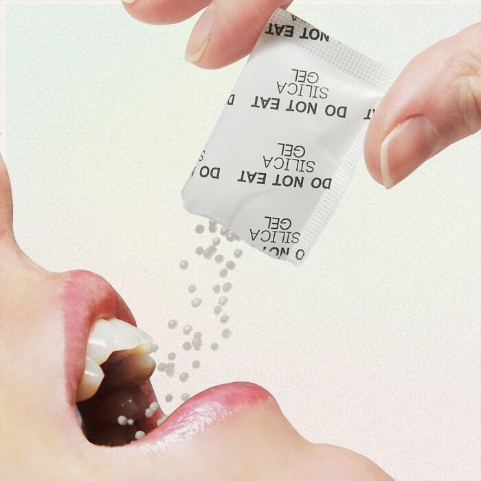 Hand pouring silica gel beads from an unusual conceptual product design into an open mouth, reflecting creative perception.