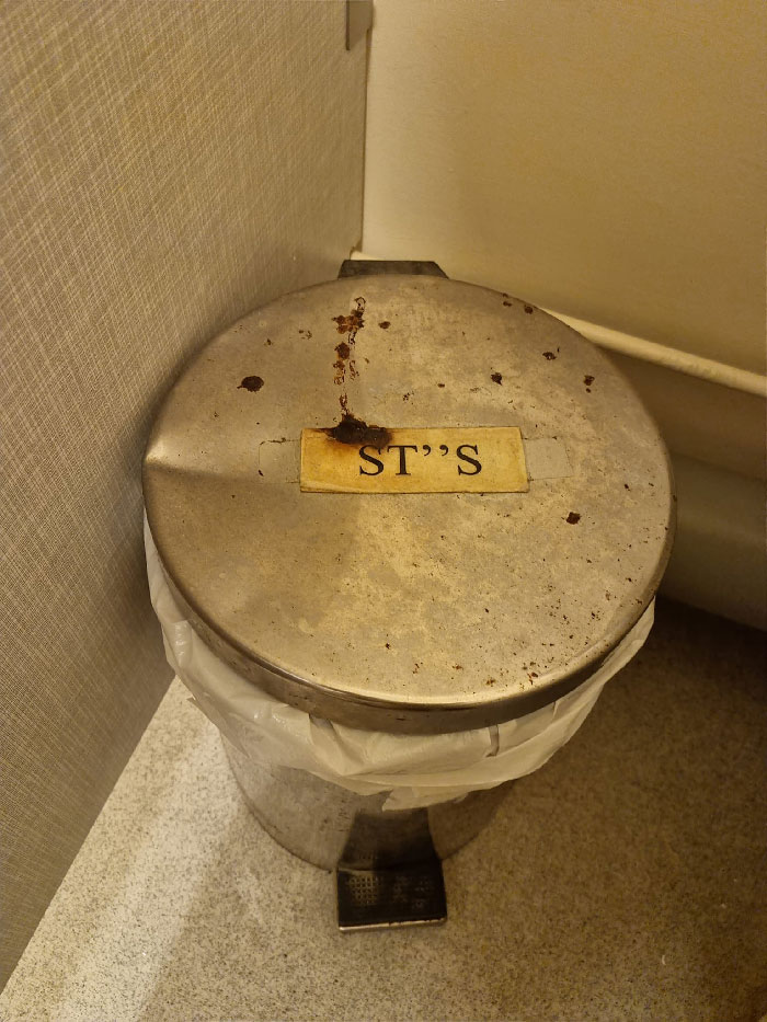 In A Community Centre Toilet Cubicle (Bathroom Stall). Took Me A Minute. (I Think/Hope The Brown Stuff Is Rust)