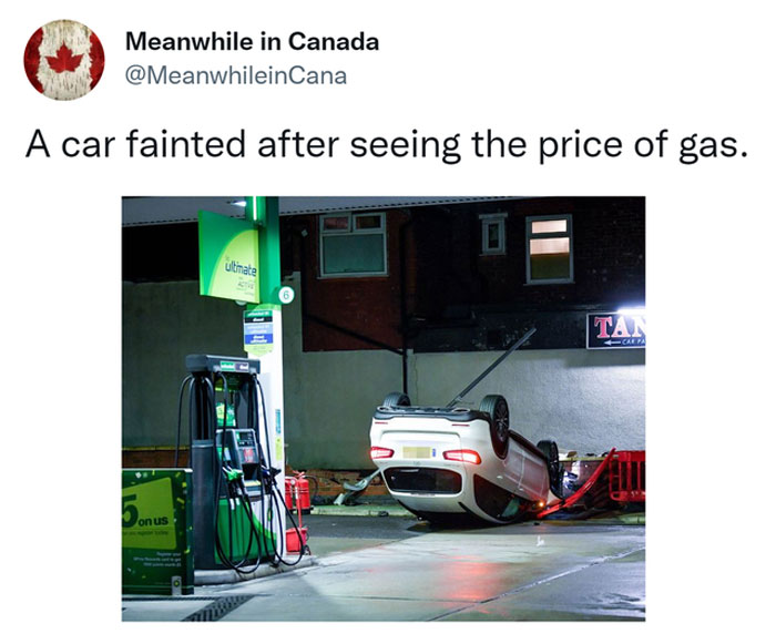 Car upside down at a gas station in Canada; meme comment on high gas prices.