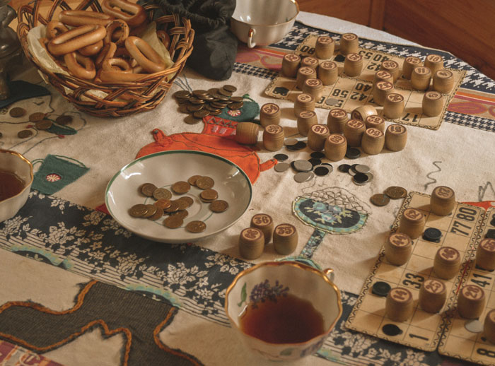 loto game and plate with coins on the table
