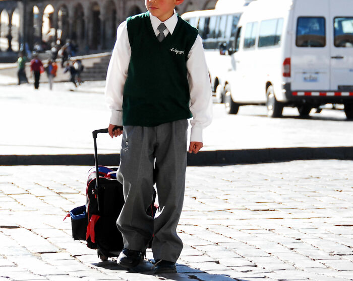boy wearing school uniform 