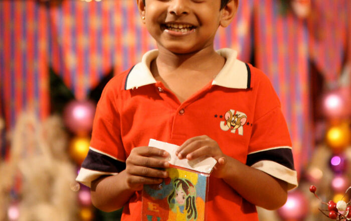 boy wearing orange t-shirt