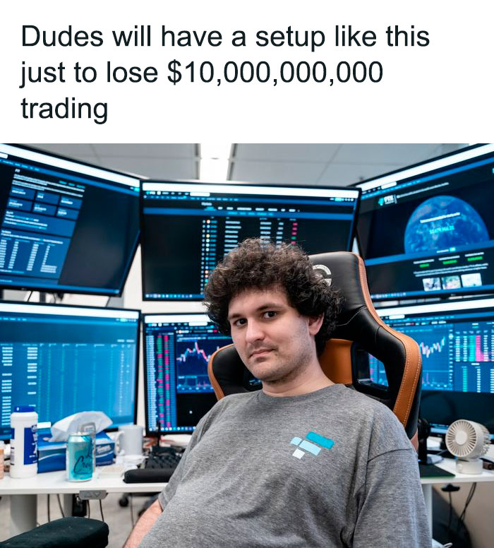 Man in a chair with multiple monitors displaying trading screens, showcasing a cursed gaming setup environment.