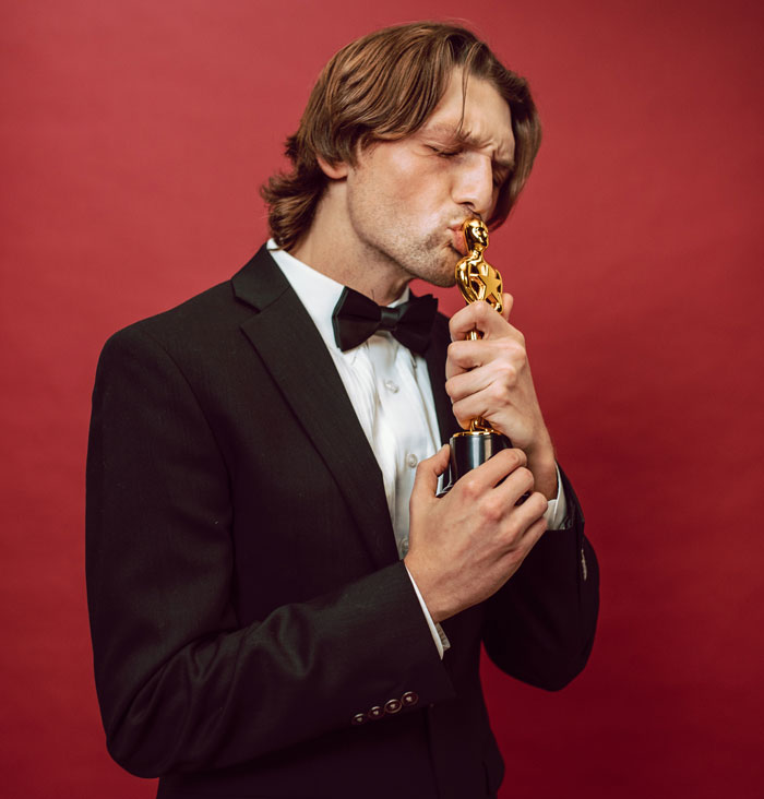 man kissing the reward