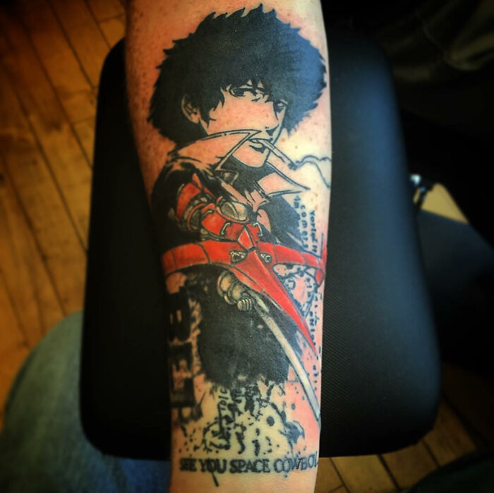 Cartoon tattoo of an animated character inspired by a popular show, featuring dynamic colors and detailed design.