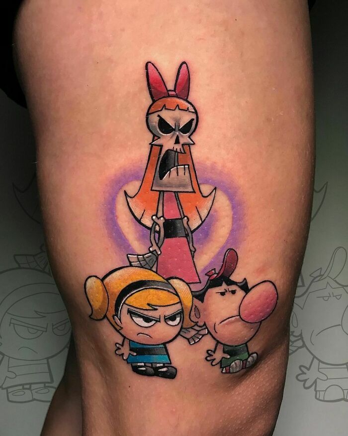 Cartoon tattoo featuring characters from an animated show with a bold, colorful design on skin.