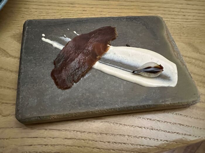 Smoked Tuna With An Onion On A Rock