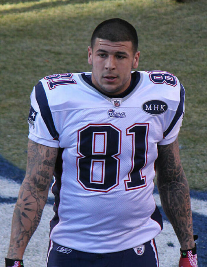 Picture of Aaron Hernandez wearing American football clothes walking
