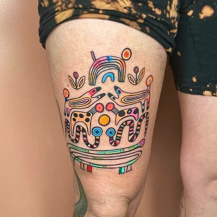 Trippy tattoo featuring colorful abstract figures on a leg, showcasing psychedelic art style.