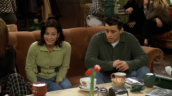 Matt Leblanc in Friends sitting on the couch