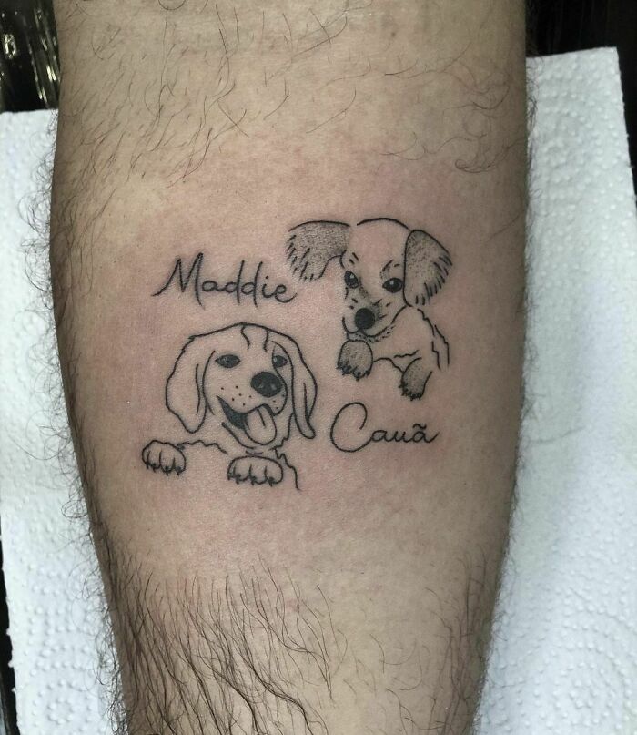 Pet tattoos of two dogs named Maddie and Cauã on a person's leg, celebrating human and pet bond.