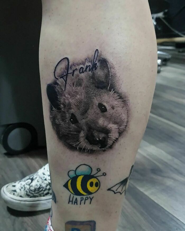 Pet tattoos featuring a detailed animal portrait and colorful bee design celebrating furry friends.