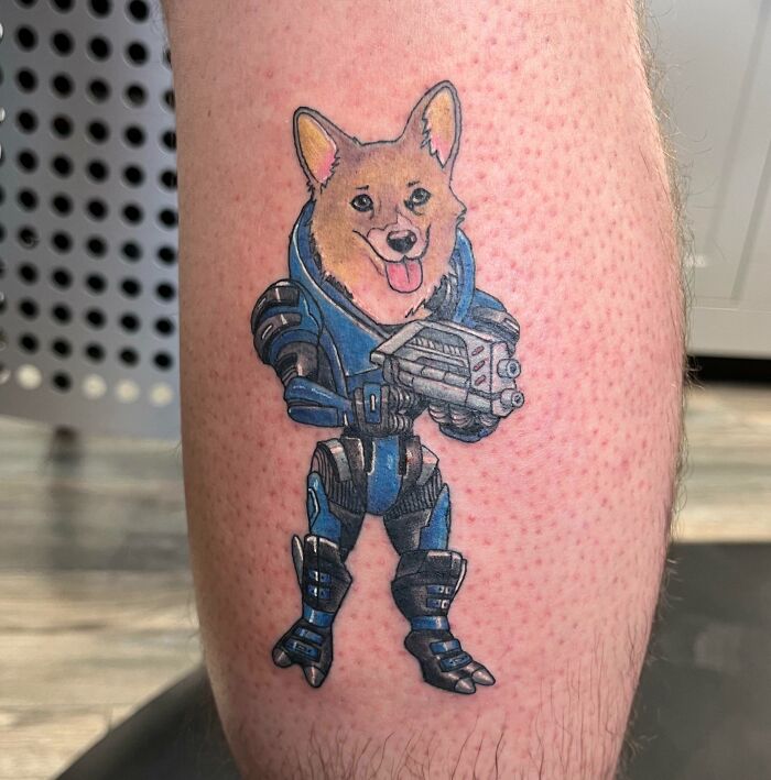 Corgi in armor tattoo celebrating furry friends, inked on skin, showcasing a blend of pet love and creativity.